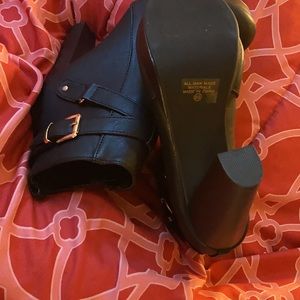A new woman’s ankle high heel boot